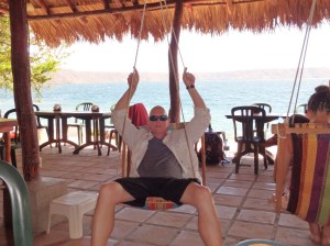 Steve kicks back in a hammock swing on the shores of the Apoyo Lagoon