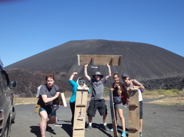 The crew of intrepid volcano boarders assembles at the foot of Cerro Negro