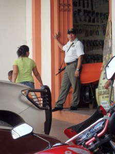 He's keeping an eye on a small hardware store.